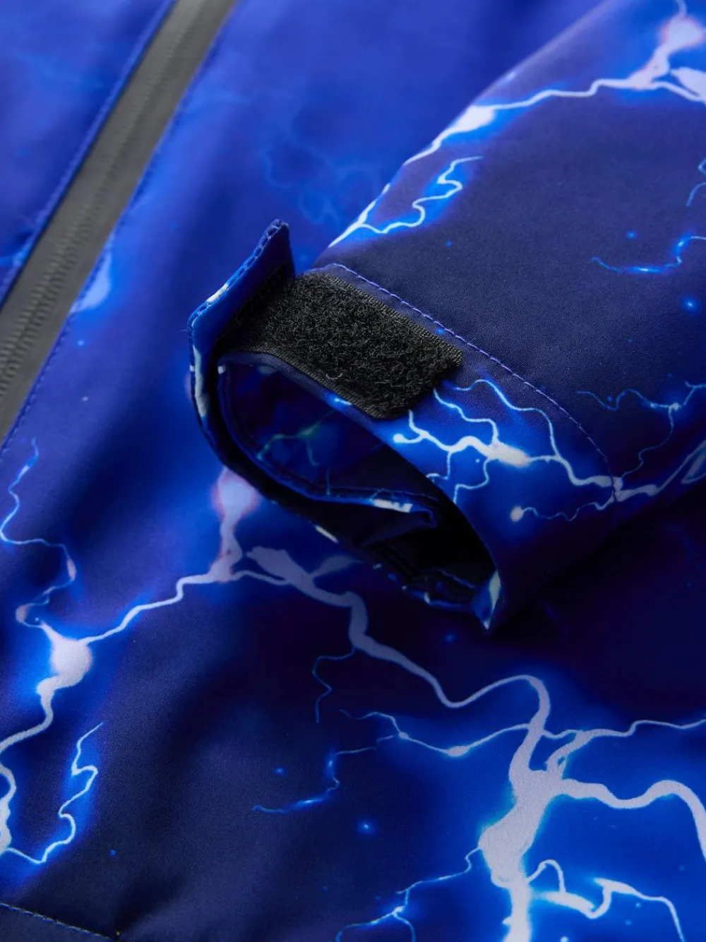 Next Blue Lightning Print Waterproof Fleece Lined Hooded Jacket (3-16yrs)^BOY Coats & Jackets|Snowsuits & Coats