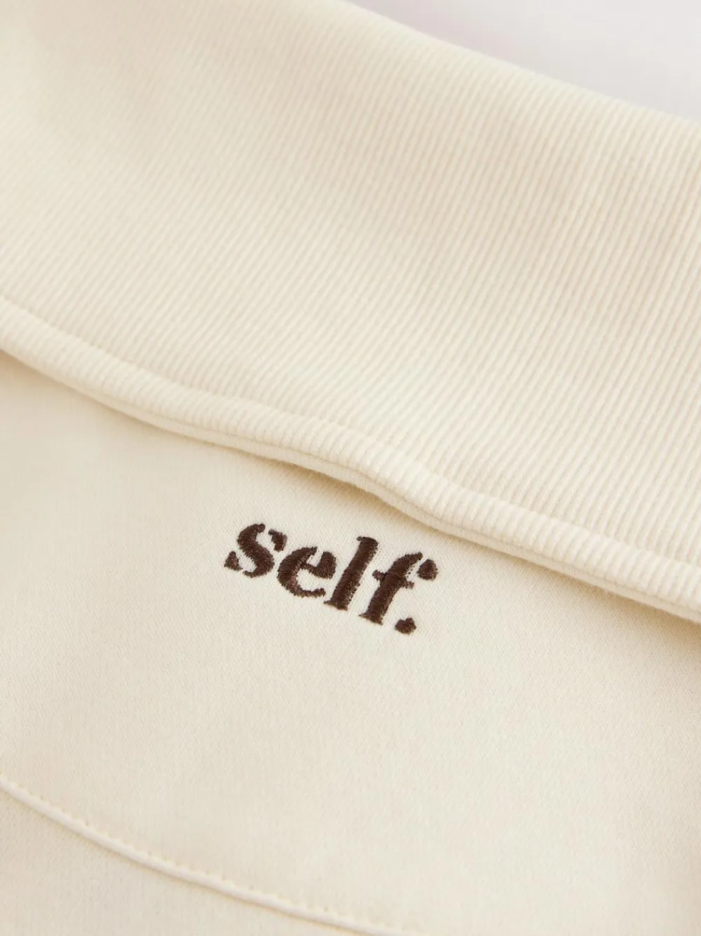 New self. Ecru Half Zip Collar Sweatshirt