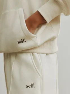New self. Ecru Half Zip Collar Sweatshirt