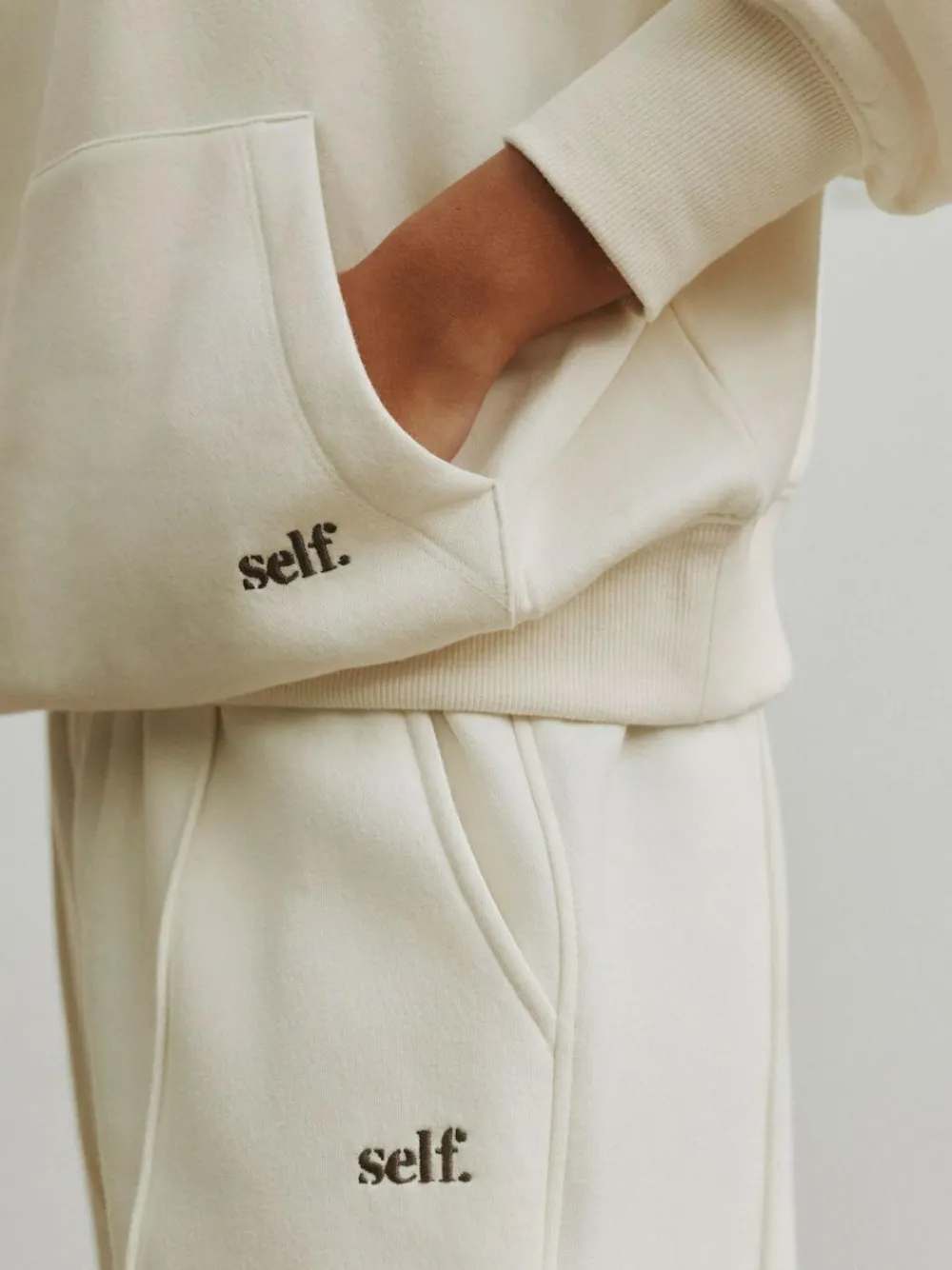 New self. Ecru Half Zip Collar Sweatshirt
